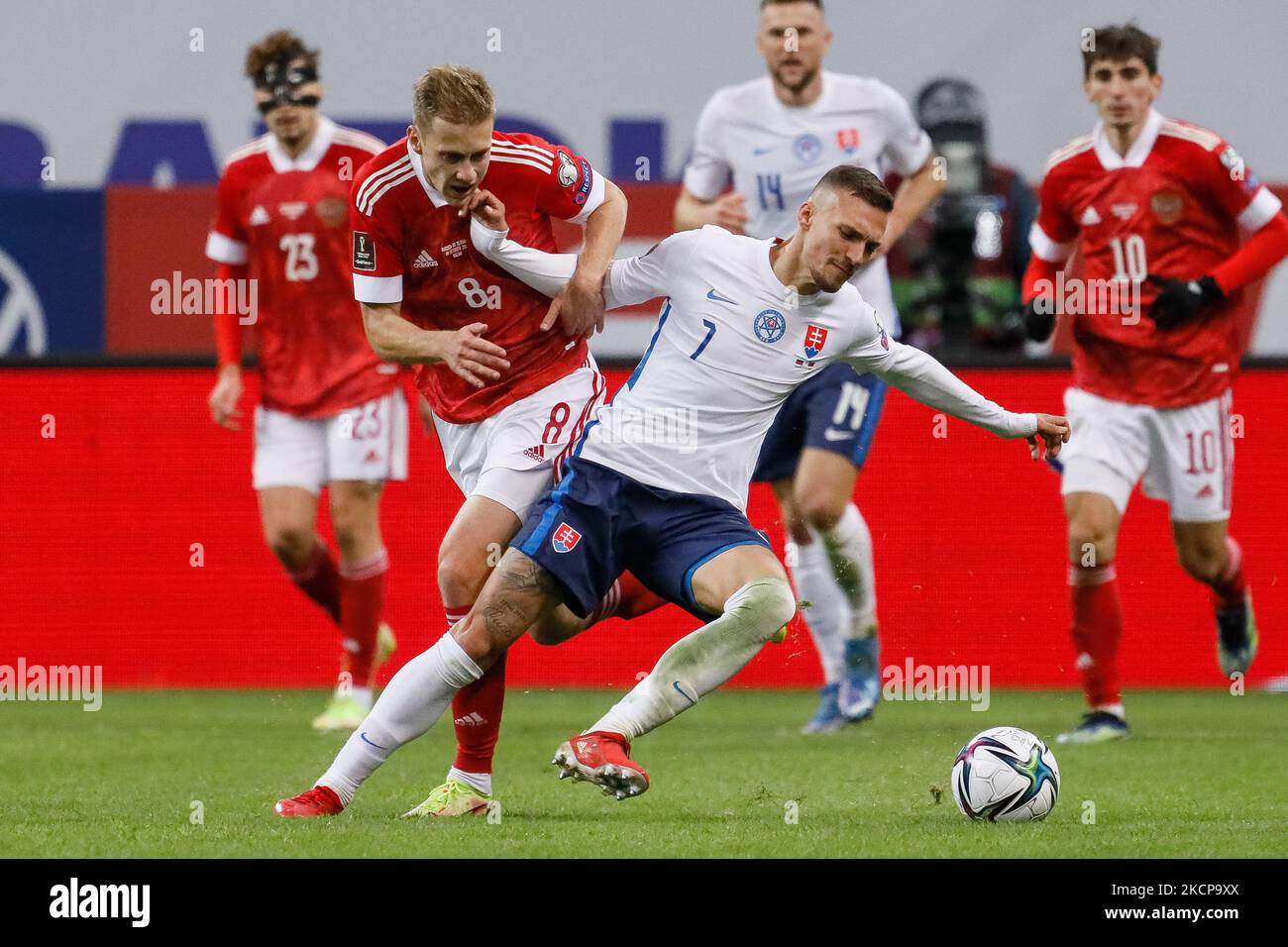 Daniil Fomin (N8) of Russia and Lukas Haraslin (N7) of Slovakia vie for the ball during the FIFA World Cup Qatar 2022 Group H european qualification football match between Russia and Slovakia on October 8, 2021 at Ak Bars Arena in Kazan, Russia. (Photo by Mike Kireev/NurPhoto) Stock Photo