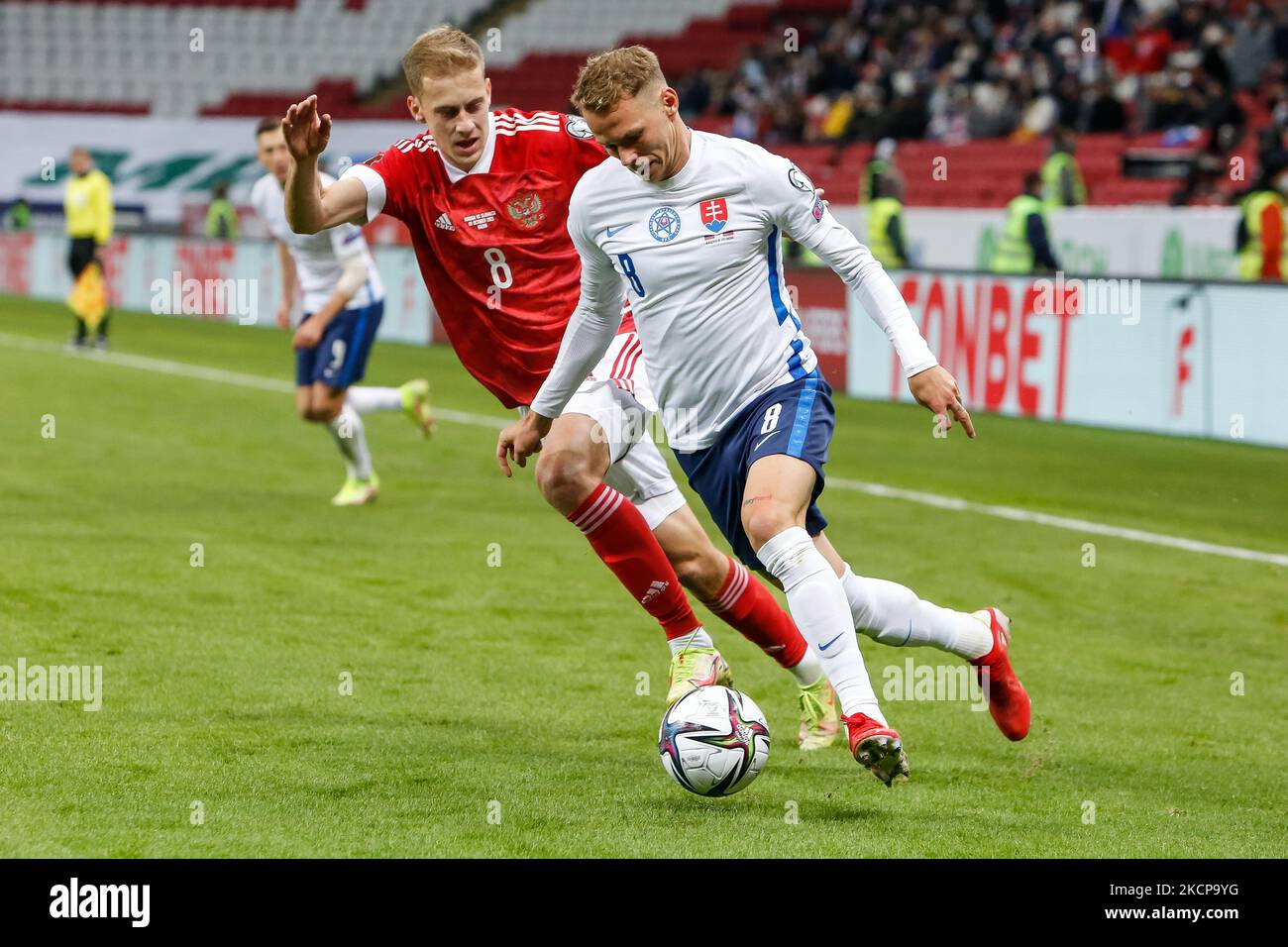 Daniil Fomin (L) of Russia and Ondrej Duda of Slovakia vie for the ball during the FIFA World Cup Qatar 2022 Group H european qualification football match between Russia and Slovakia on October 8, 2021 at Ak Bars Arena in Kazan, Russia. (Photo by Mike Kireev/NurPhoto) Stock Photo