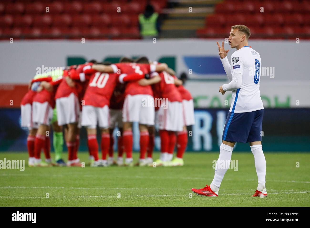Ondrej Duda (R) of Slovakia gestures as Russia players are seen gathered in circle in the background during the FIFA World Cup Qatar 2022 Group H european qualification football match between Russia and Slovakia on October 8, 2021 at Ak Bars Arena in Kazan, Russia. (Photo by Mike Kireev/NurPhoto) Stock Photo