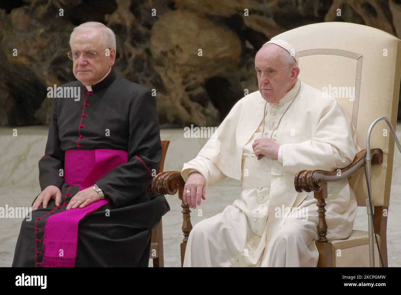 Pope Francis and Italian priest, Monsignor Leonardo Sapienza (L) attend