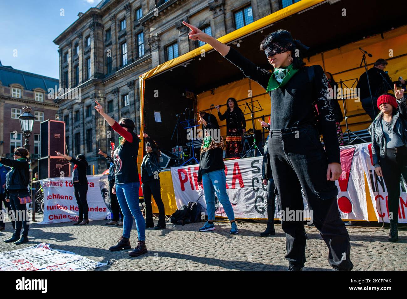 Chilean women are performing the activist song The rapist is you by Las Tesis, during the demonstration on the second anniversary of the Chilean social outbreak organized in Amsterdam, on October 16th, 2021. (Photo by Romy Arroyo Fernandez/NurPhoto) Stock Photo