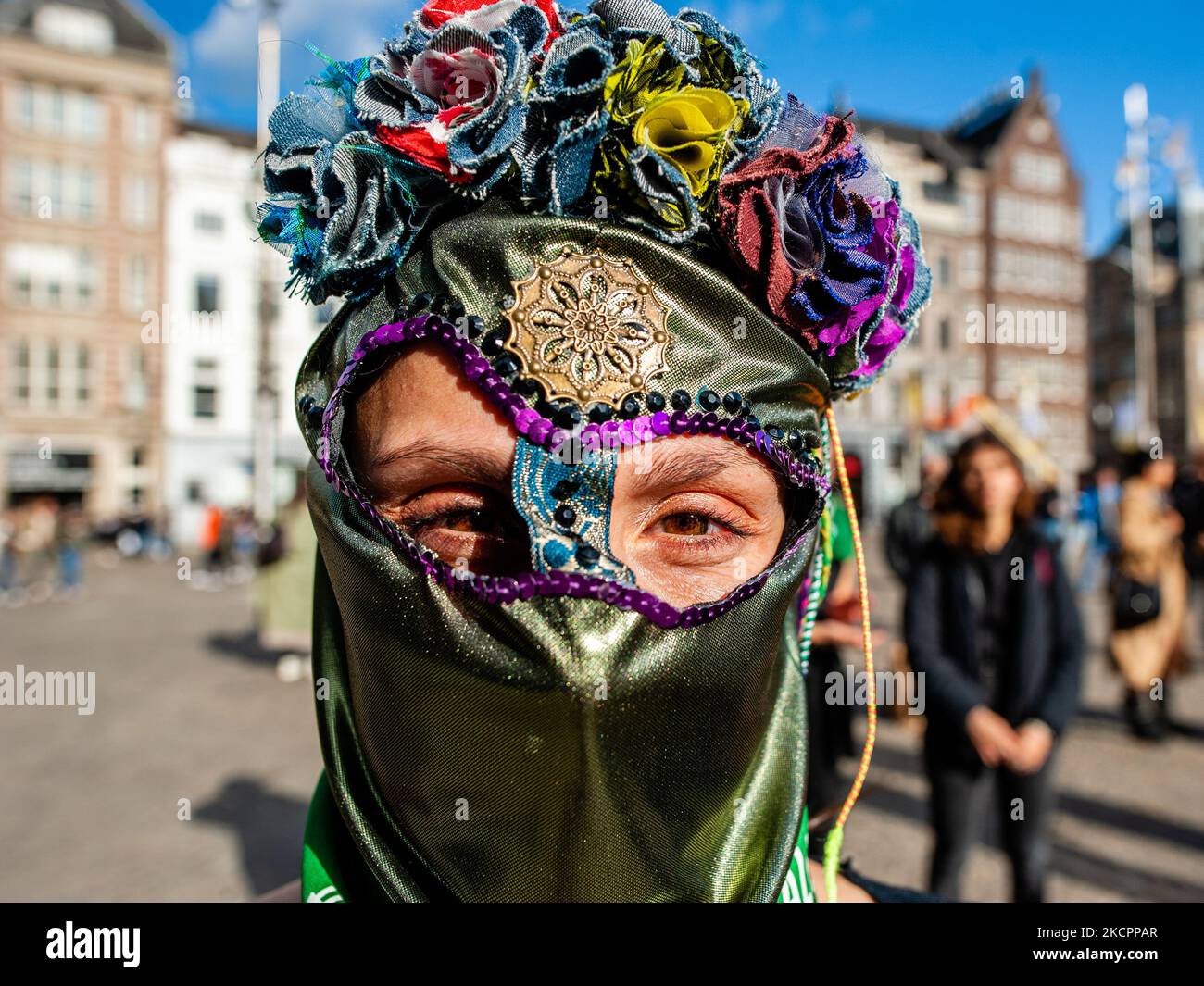 A Chilean woman is wearing a typical Chilean mask covering all her face, during the demonstration on the second anniversary of the Chilean social outbreak organized in Amsterdam, on October 16th, 2021. (Photo by Romy Arroyo Fernandez/NurPhoto) Stock Photo