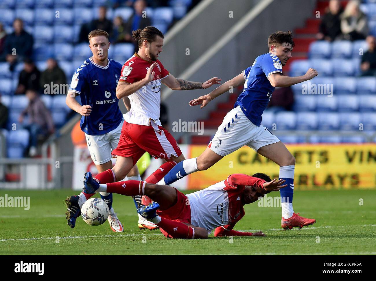 Oldham Athletic's Jamie Bowden tussles with Terence Vancooten of Stevenage Football Club during the Sky Bet League 2 match between Oldham Athletic and Stevenage at Boundary Park, Oldham on Saturday 16th October 2021. (Photo by Eddie Garvey/MI News/NurPhoto) Stock Photo