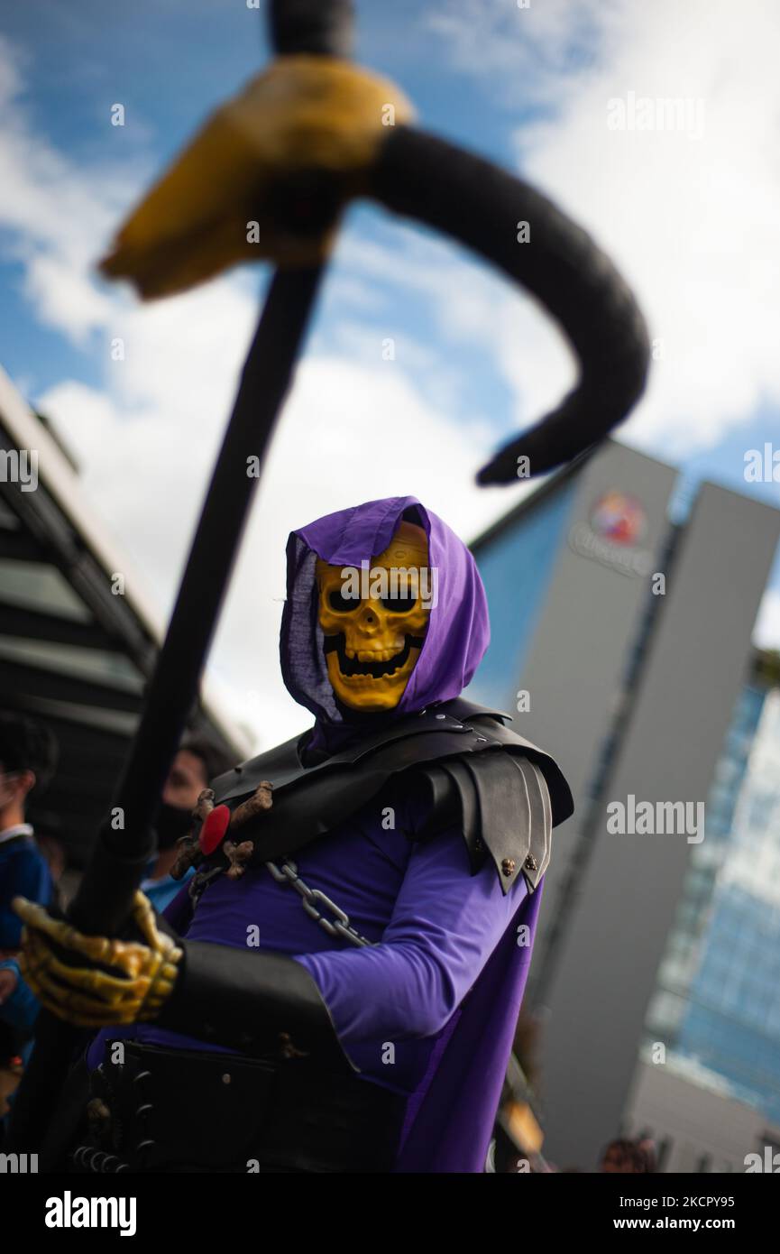 A fan of Hee-Man poses for a photo using a costume of Skeletor during the fourth day of the SOFA (Salon del Ocio y la Fantasia) 2021, a fair aimed to the geek audience in Colombia that mixes Cosplay, gaming, superhero and movie fans from across Colombia, in Bogota, Colombia on October 17, 2021. (Photo by Sebastian Barros/NurPhoto) Stock Photo