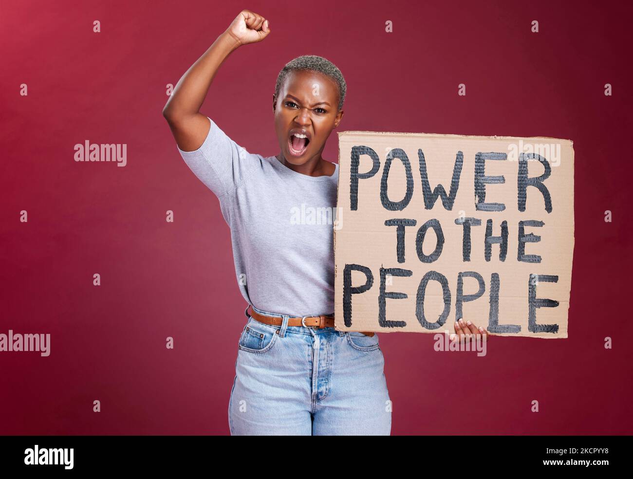 Black woman, protest and poster for human rights, power and equality or asking for change and freedom to stop racism. African female shout, fight and Stock Photo
