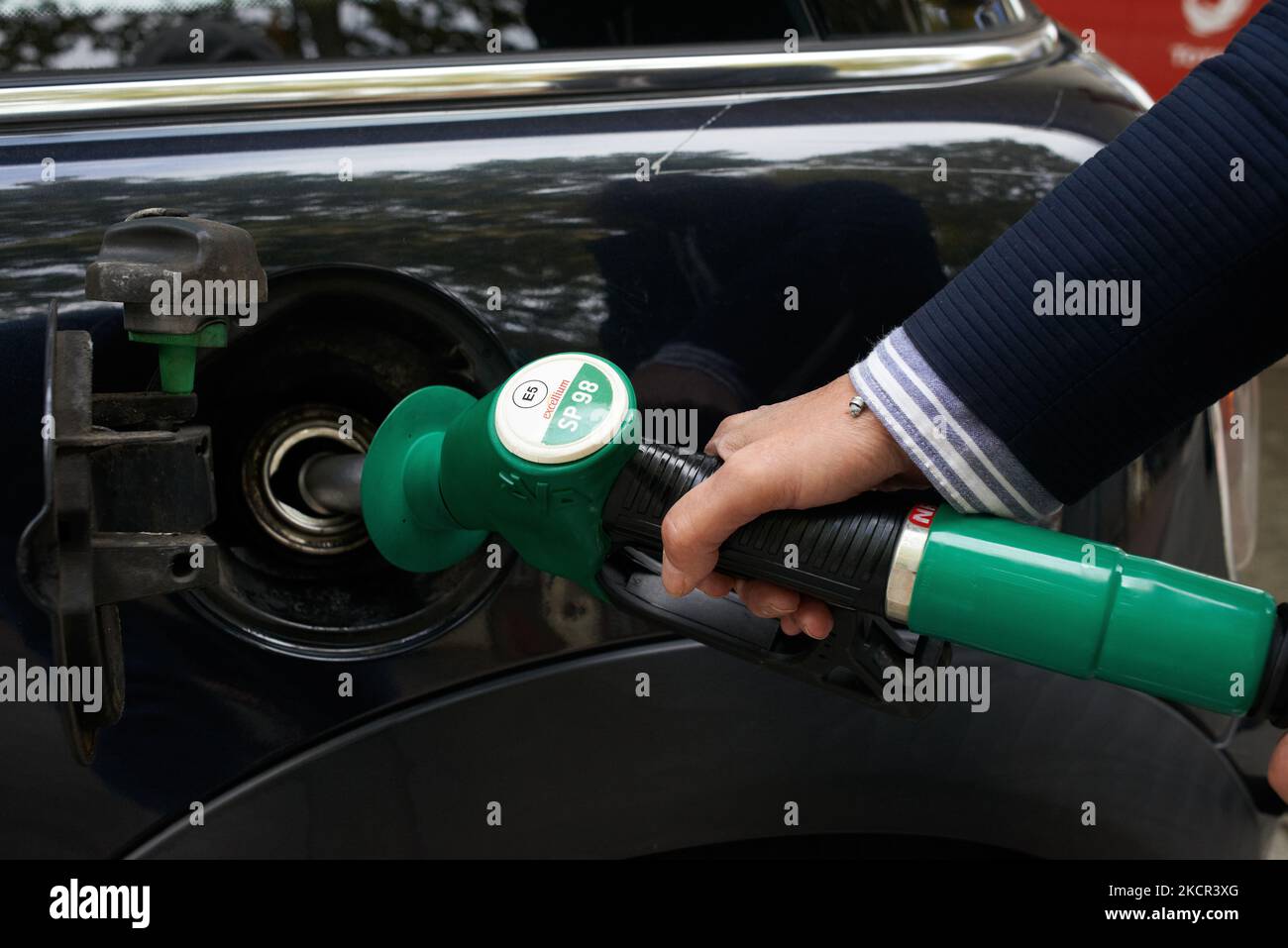 A man refills his car at a gas station in toulouse. The French government prepares to announce a plan to help consumers to pay their bill of fuel as energy prices skyrocketed after the Covid-19 pandemic. The price of fuel is nearly an all time high. The Macron's government want to subsidy the use of fossil fuels to help people. They fear a resumtion of the Gilets Jaunes protests which began nearly three years ago about the price of gasoline as the french campaign for presidential election will really begin in the next months. Toulouse. France. October 20th 2021. (Photo by Alain Pitton/NurPhoto Stock Photo