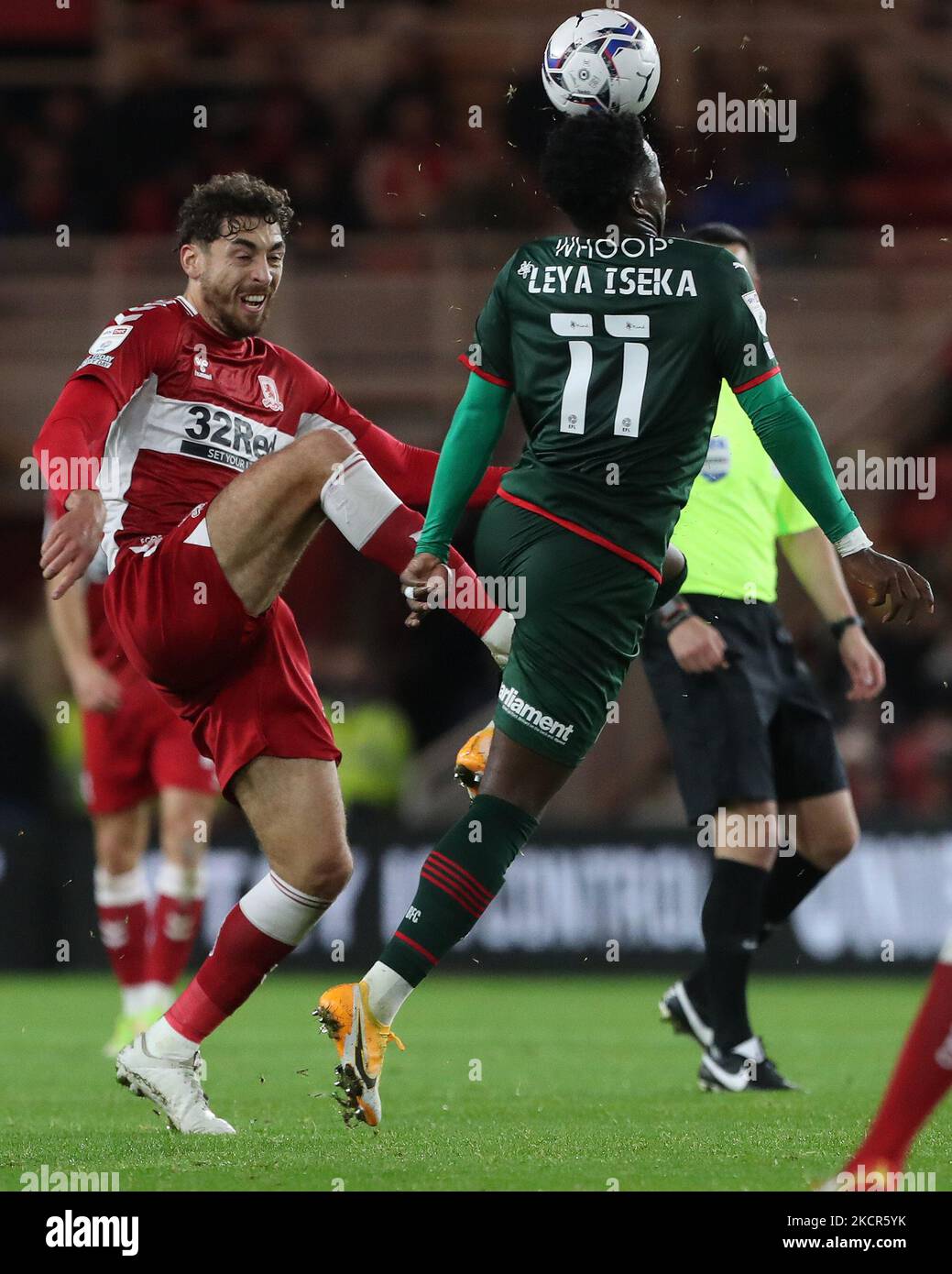 Middlesbrough's Matt Crooks lobs the ball over Barnsley's Aaron Leya Iseka during the Sky Bet Championship match between Middlesbrough and Barnsley at the Riverside Stadium, Middlesbrough on Wednesday 20th October 2021. (Photo by Mark Fletcher/MI News/NurPhoto) Stock Photo