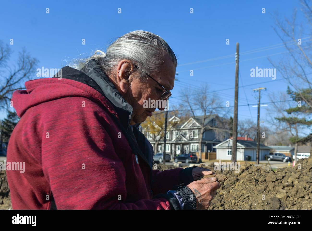 Elder Fernie Marty from the Papaschase First Nation, monitors excavations on the grounds of the former Charles Camsell Hospital, in Edmonton. Second phase of excavation work began today at the site of the former Charles Camsell Hospital, the Edmonton facility that for decades was used to treat Indigenous people with tuberculosis. First Nation members have been calling for construction to stop at the grounds where many believe patients may have been buried. The search is being funded by the property's developer. On Thursday, 21 October 2021, in Inglewood, Edmonton, Alberta, Canada. (Photo by Ar Stock Photo