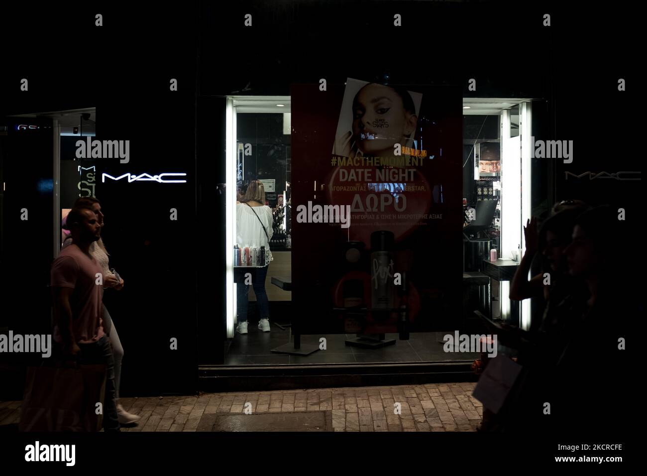 A MAC store. Thousands of people are shopping on Saturday afternoon, in Ermou Street in the