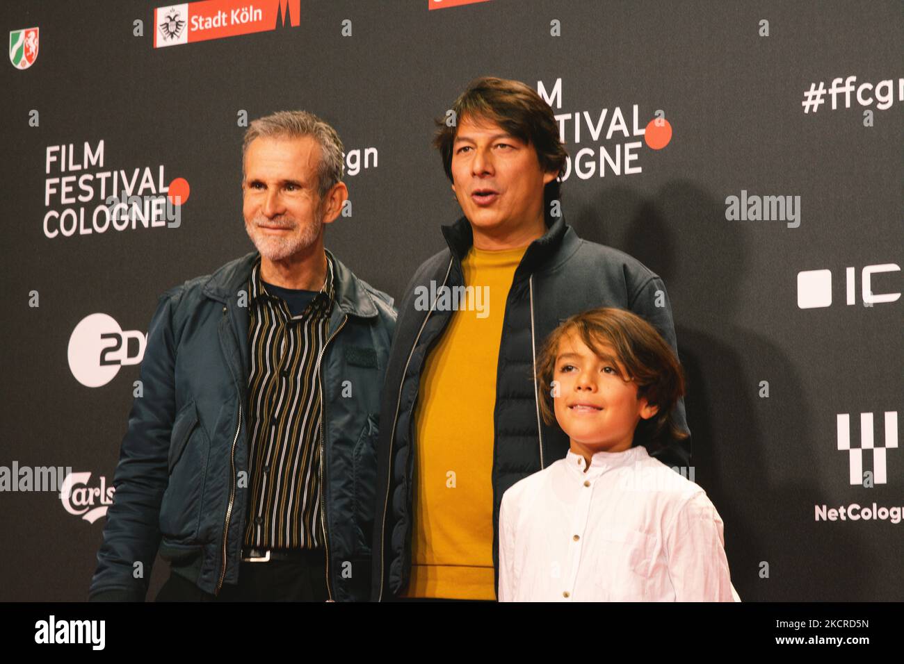 Actor Elia Gezer and Ulrich Matthes and film director Sebastian Ko attend the 'Geborgtes Weiss' photo call at Cologne film festival at Cologne filmpalast on Oct 23, 2021 (Photo by Ying Tang/NurPhoto) Stock Photo