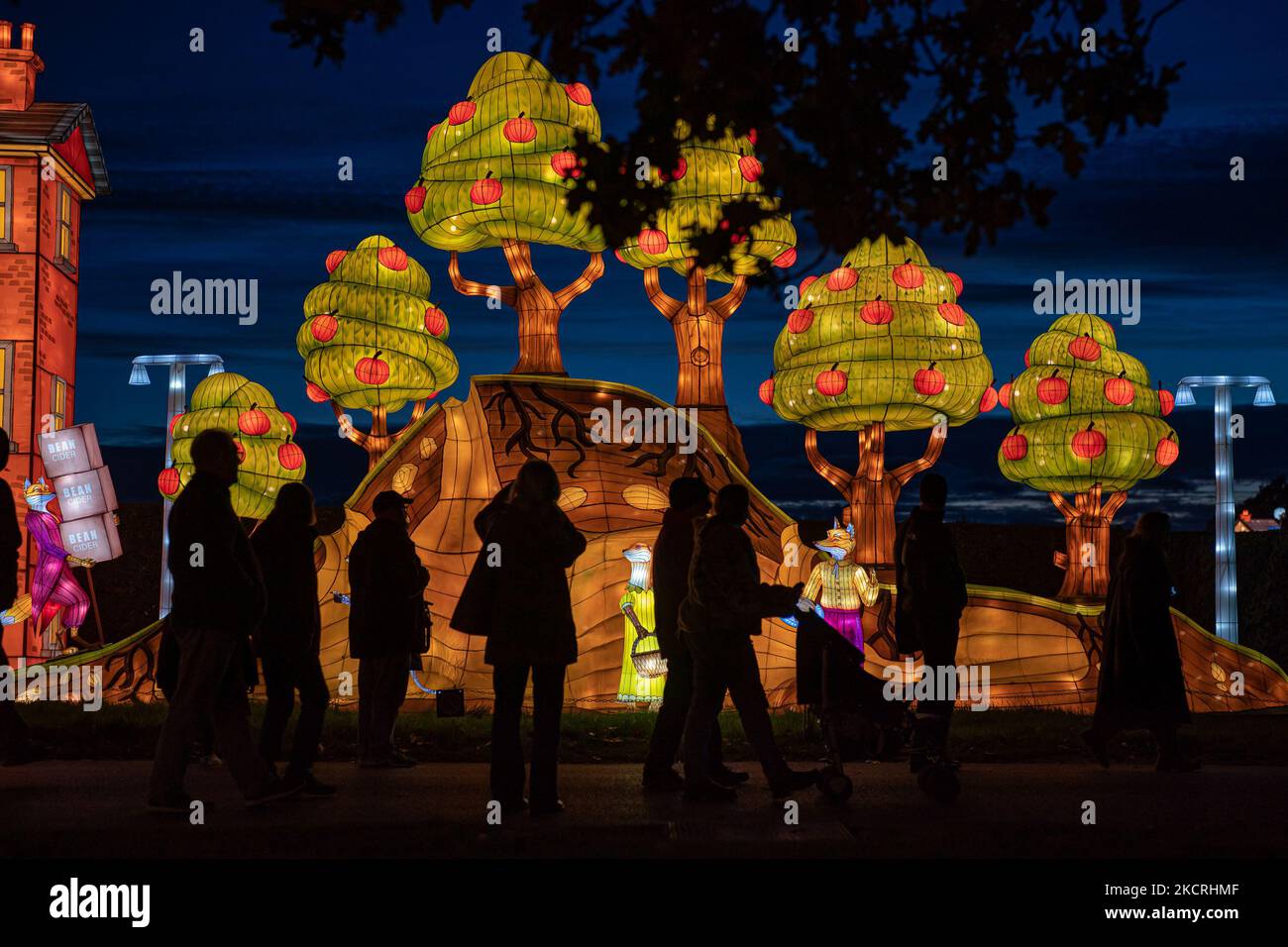 people-walk-past-fantastic-mr-fox-illuminations-at-longleat-festival-of
