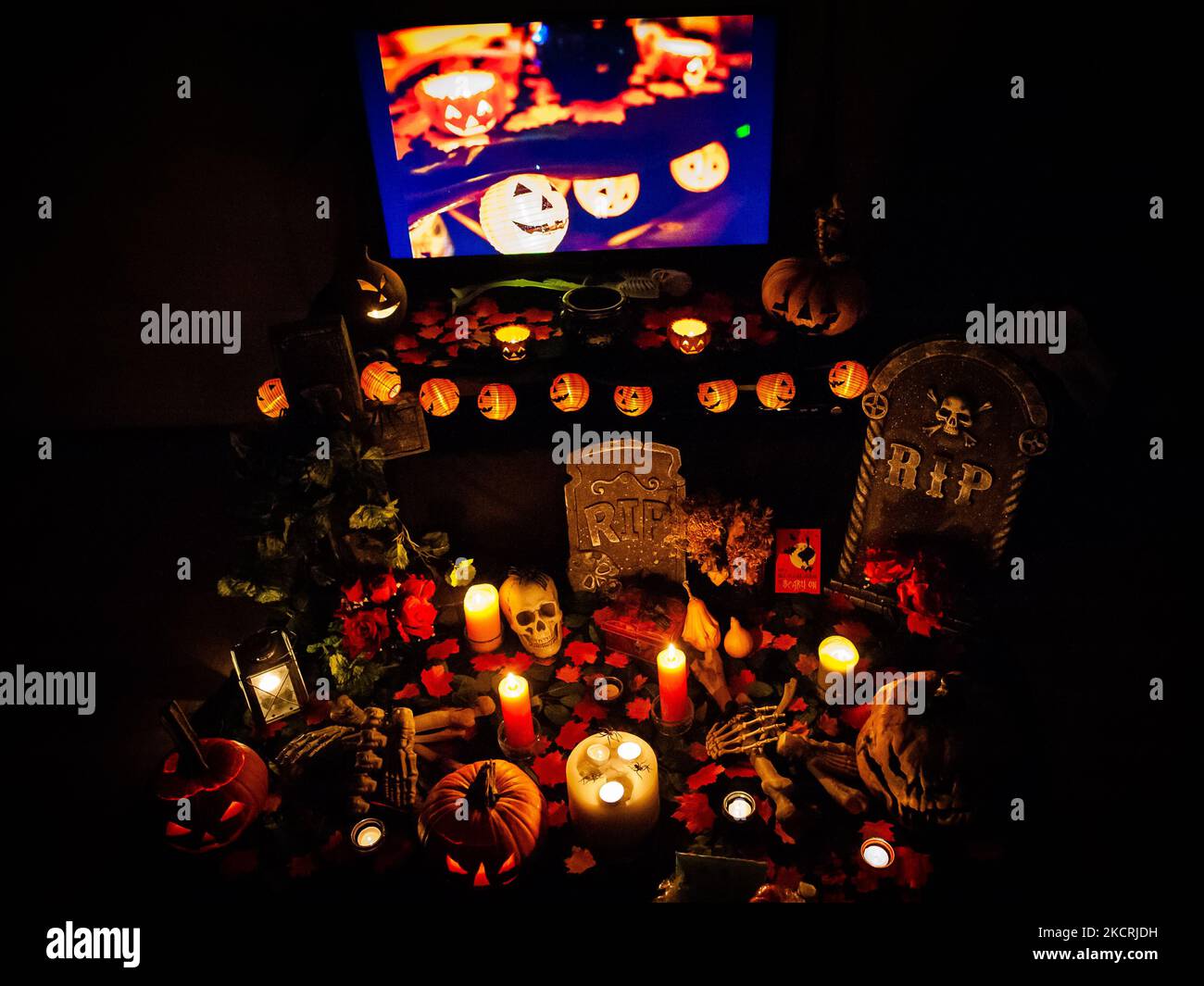 A Halloween decoration set has been placed in a living room to