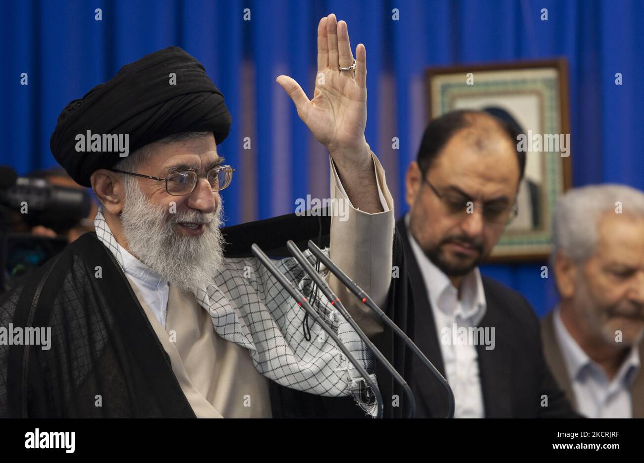 Khamenei Smiling Iran's Supreme Leader Ayatollah Ali Khamenei gestures while attending ...
