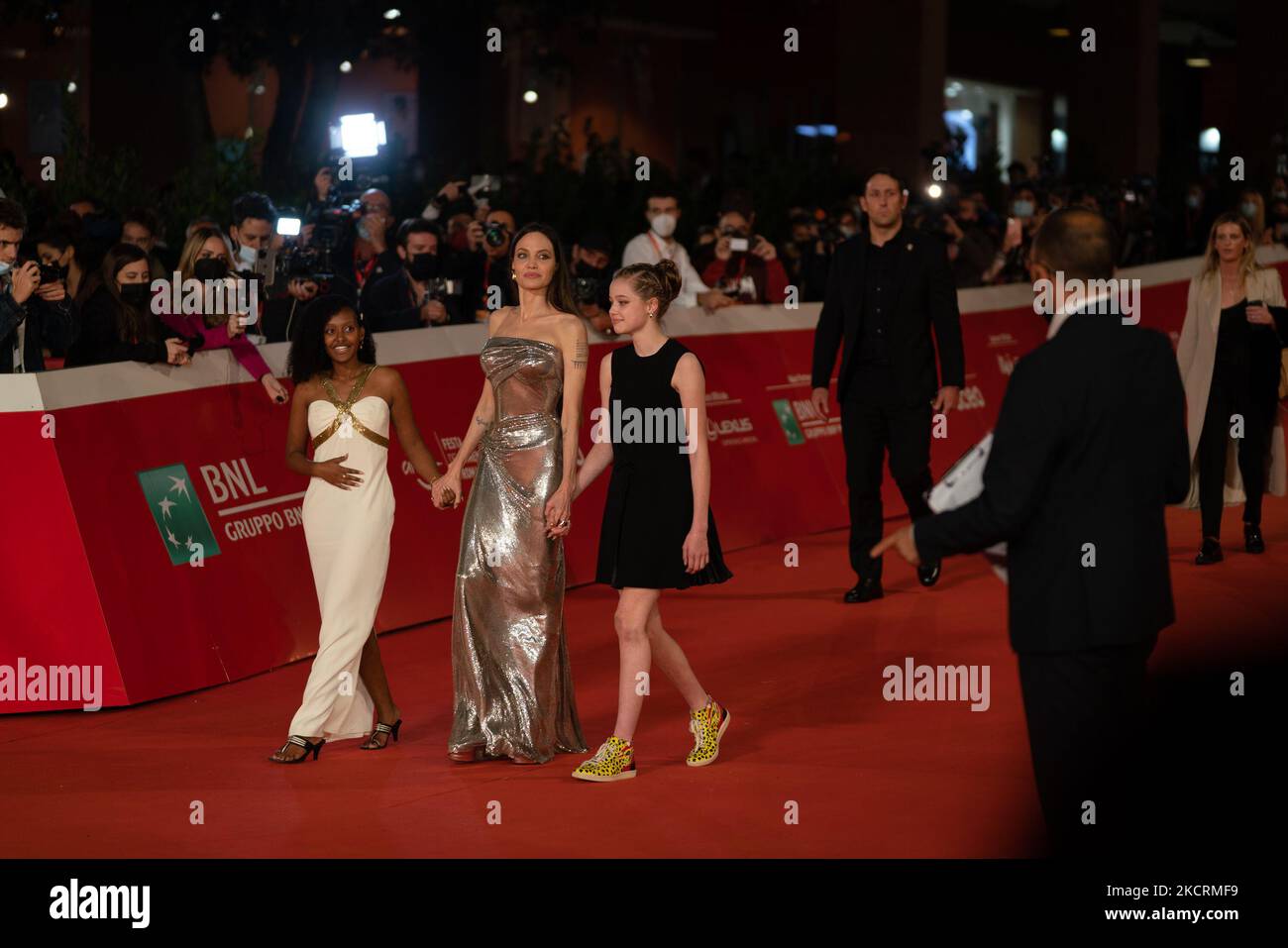 (L-R) Zahara Marley Jolie-Pitt, Angelina Jolie and Shiloh Jolie-Pitt attend the red carpet of the movie 'Eternals' during the 16th Rome Film Fest 2021 on October 24, 2021 in Rome, Italy. (Photo by Luca Carlino/NurPhoto) Stock Photo