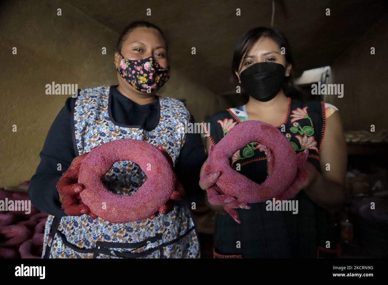 Women hold rodeos and animas (Pan de Muerto), made inside a collective ...