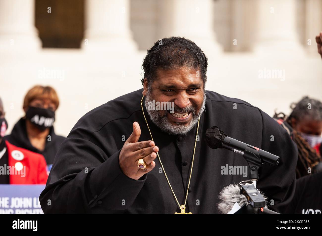 Bishop William Barber speaks during a rally at the Supreme Court for voting rights and economic justice. Protesters are demanding that Congress to pass legislation protecting the right to vote and providing economic assistance to Americans. Specifically, they want passage of the Freedom to Vote Act, the Build Back Better Act, and the Infrastructure Investment and Jobs Act. (Photo by Allison Bailey/NurPhoto) Stock Photo
