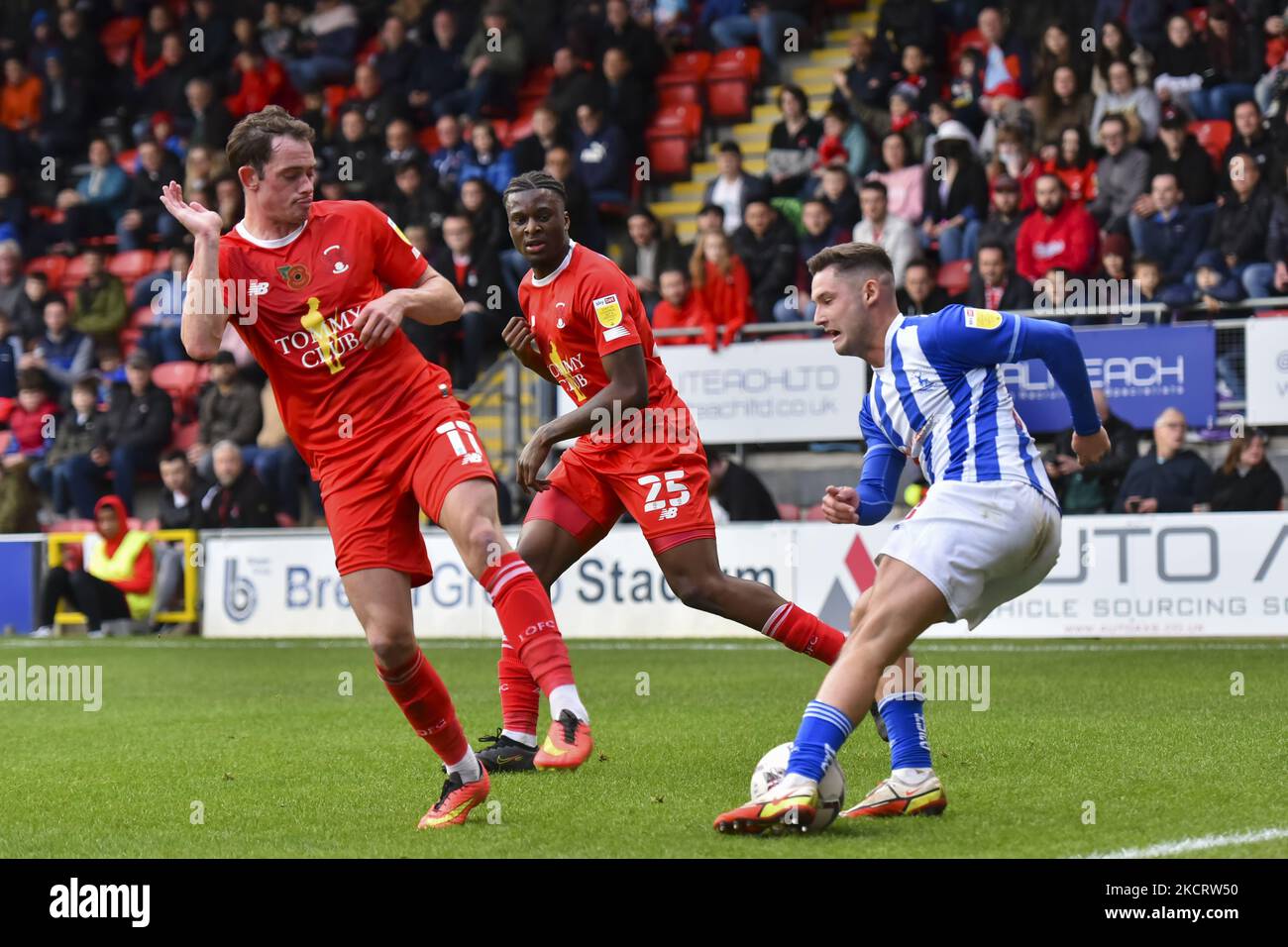 Hartlepool United's Luke Molyneux in action with Altrincham's Andy News  Photo - Getty Images