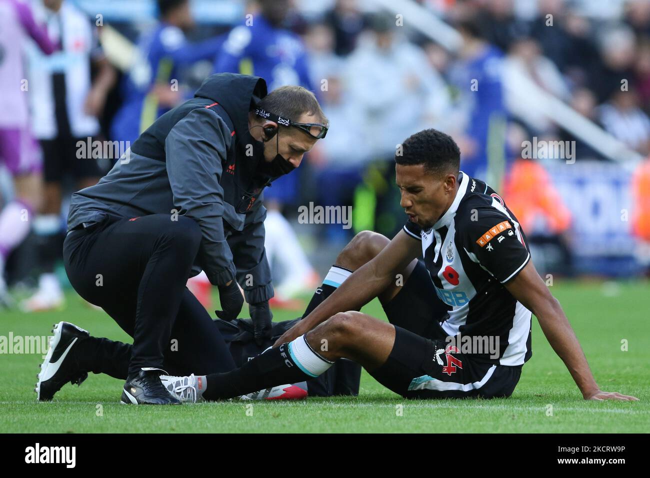 Isaac Hayden of Newcastle United receives medical treatment during the Premier League match between Newcastle United and Chelsea at St. James's Park, Newcastle on Saturday 30th October 2021. (Photo by Will Matthews/MI News/NurPhoto) Stock Photo