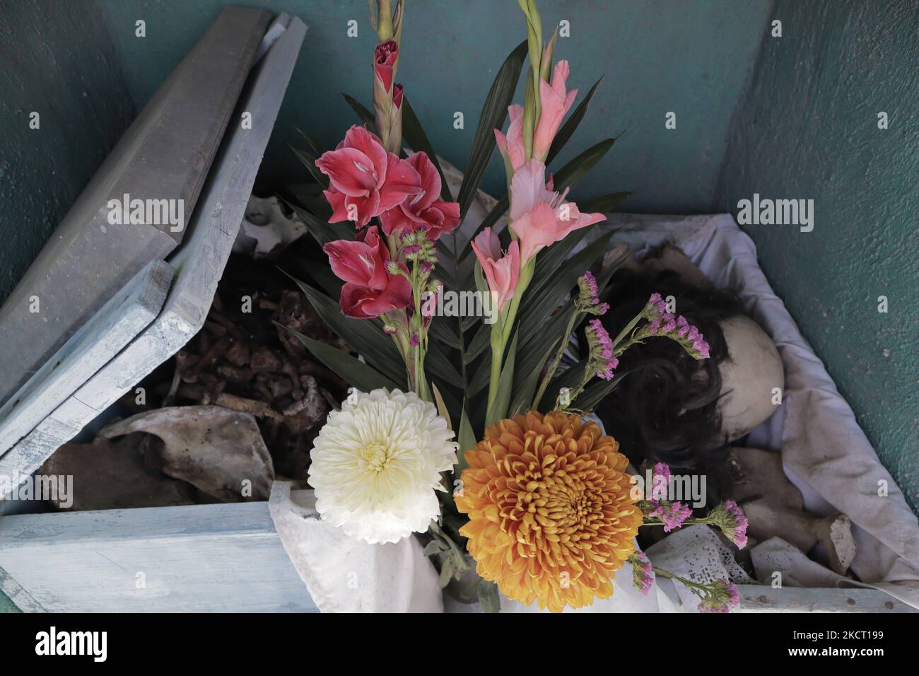 Human remains inside a box in the cemetery of Pomuch, an indigenous Mayan community located in