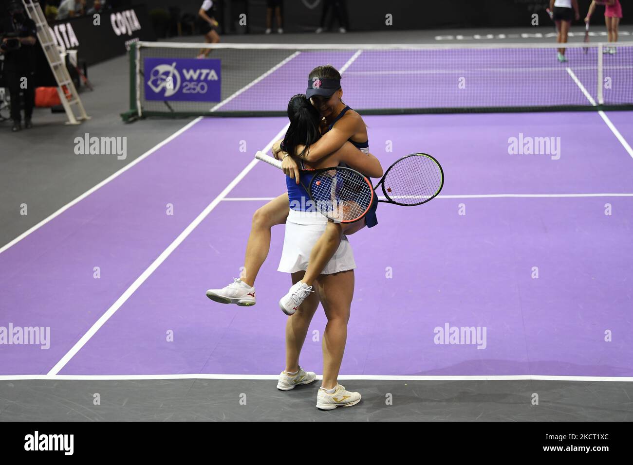 Portraits of Ekaterine Gorgodze and Irina Bara celebrating after winning the final match against Lesley Pattinama Kerkhove, Aleksandra Krunic in the Transylvania Open WTA 250 Tournament, Cluj-Napoca, 31 October 2021 (Photo by Flaviu Buboi/NurPhoto) Stock Photo