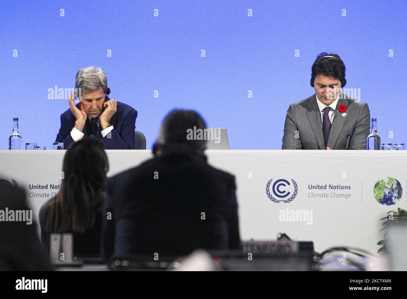 U.S. Special Presidential Envoy for Climate John Kerry and Canada's Prime Minister Justin Trudeau attends a meeting on day three of the COP 26 United Nations Climate Change Conference on November 02, 2021 in Glasgow, Scotland. (Photo by Ewan Bootman/NurPhoto) Stock Photo