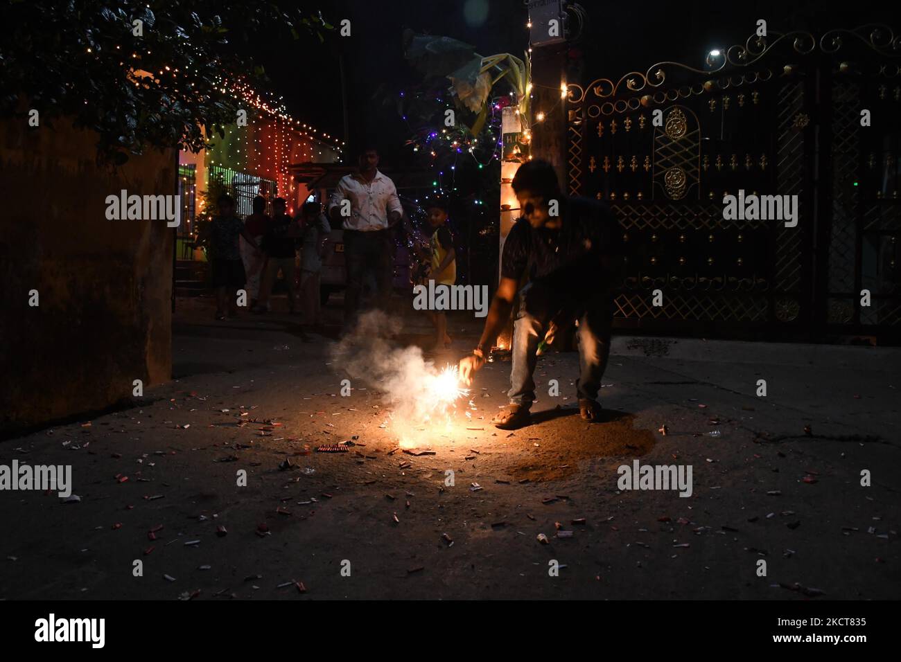 People light fireworks to celebrate Diwali, the Hindu festival of