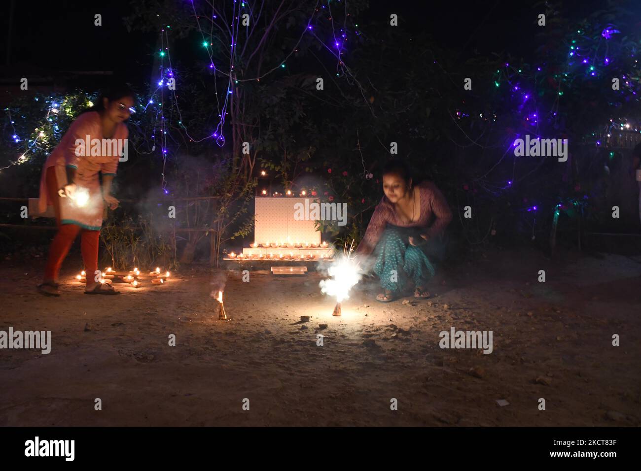 People light fireworks to celebrate Diwali, the Hindu festival of