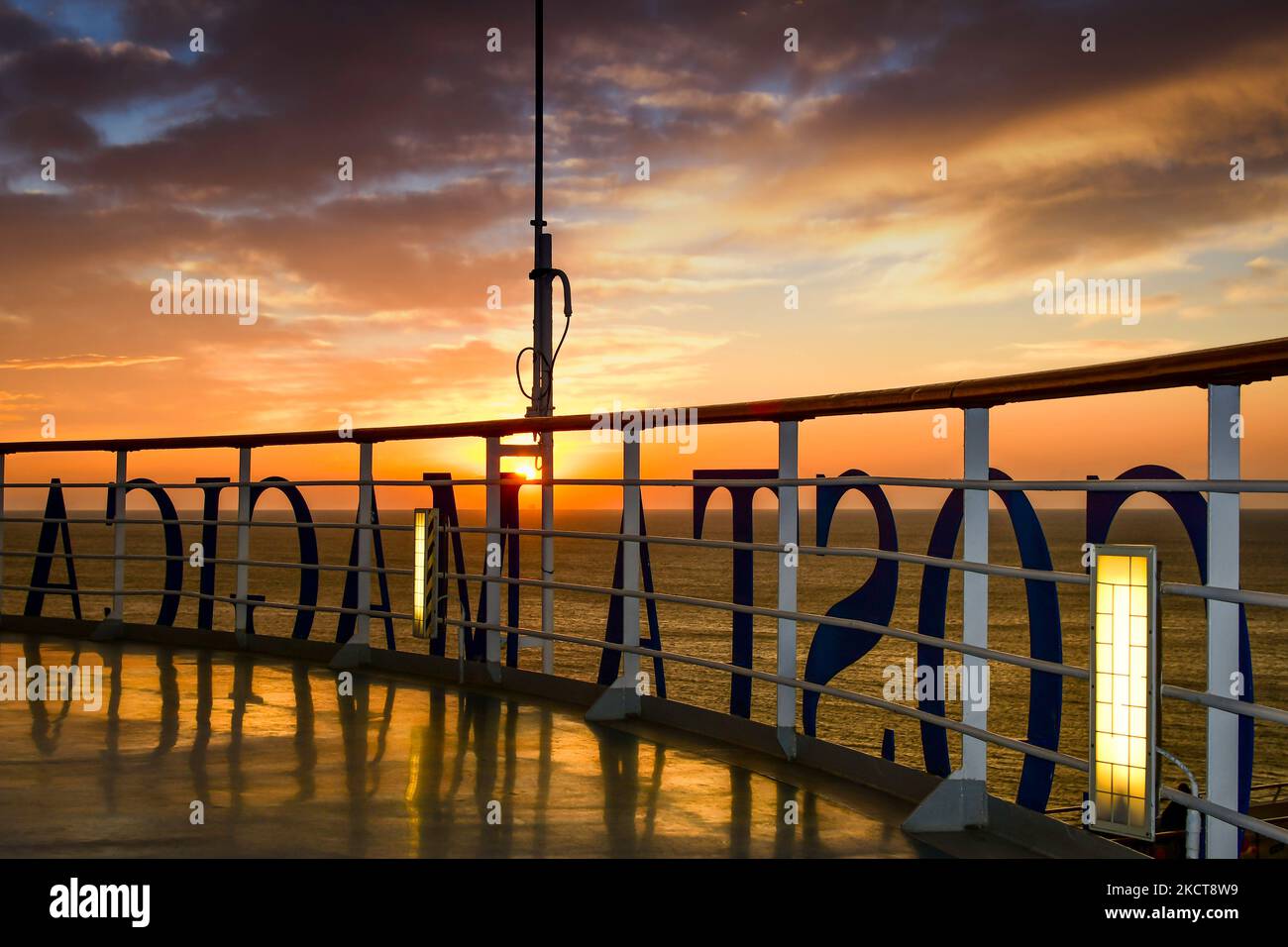 Sunset from a cruise ship in navigation Stock Photo - Alamy
