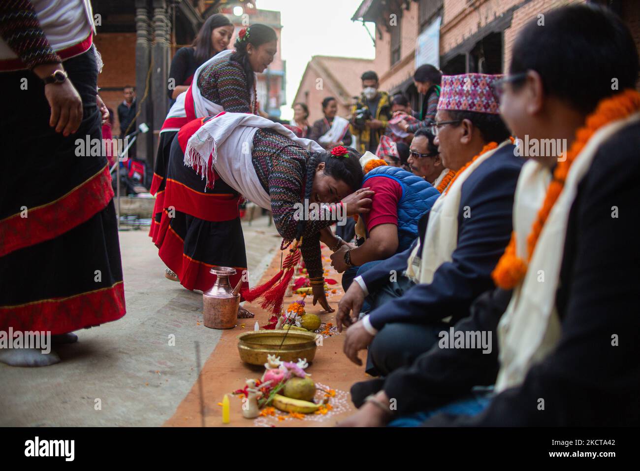 Nepalese people take part in a mass Mha: Pooja ceremony at Khokana, Lalitpur on Friday, November 5, 2021. Mha: Pooja meaning worshipping own bodies in local languages is observed on the fourth day of the Tihar festival especially by the Newar community. (Photo by Rojan Shrestha/NurPhoto) Stock Photo