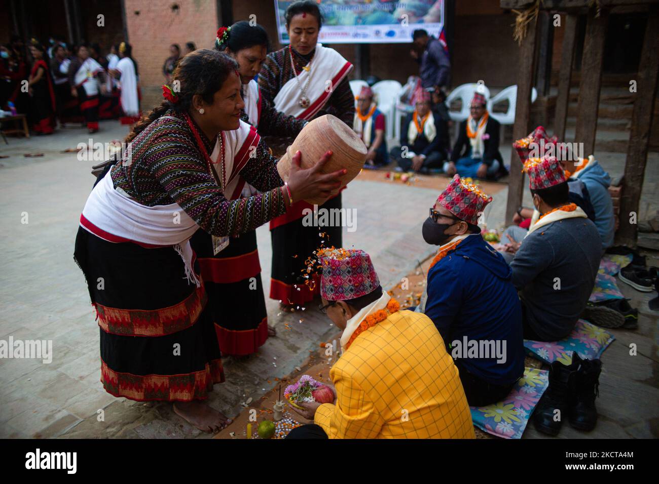 Nepalese people take part in a mass Mha Pooja ceremony at Khokana