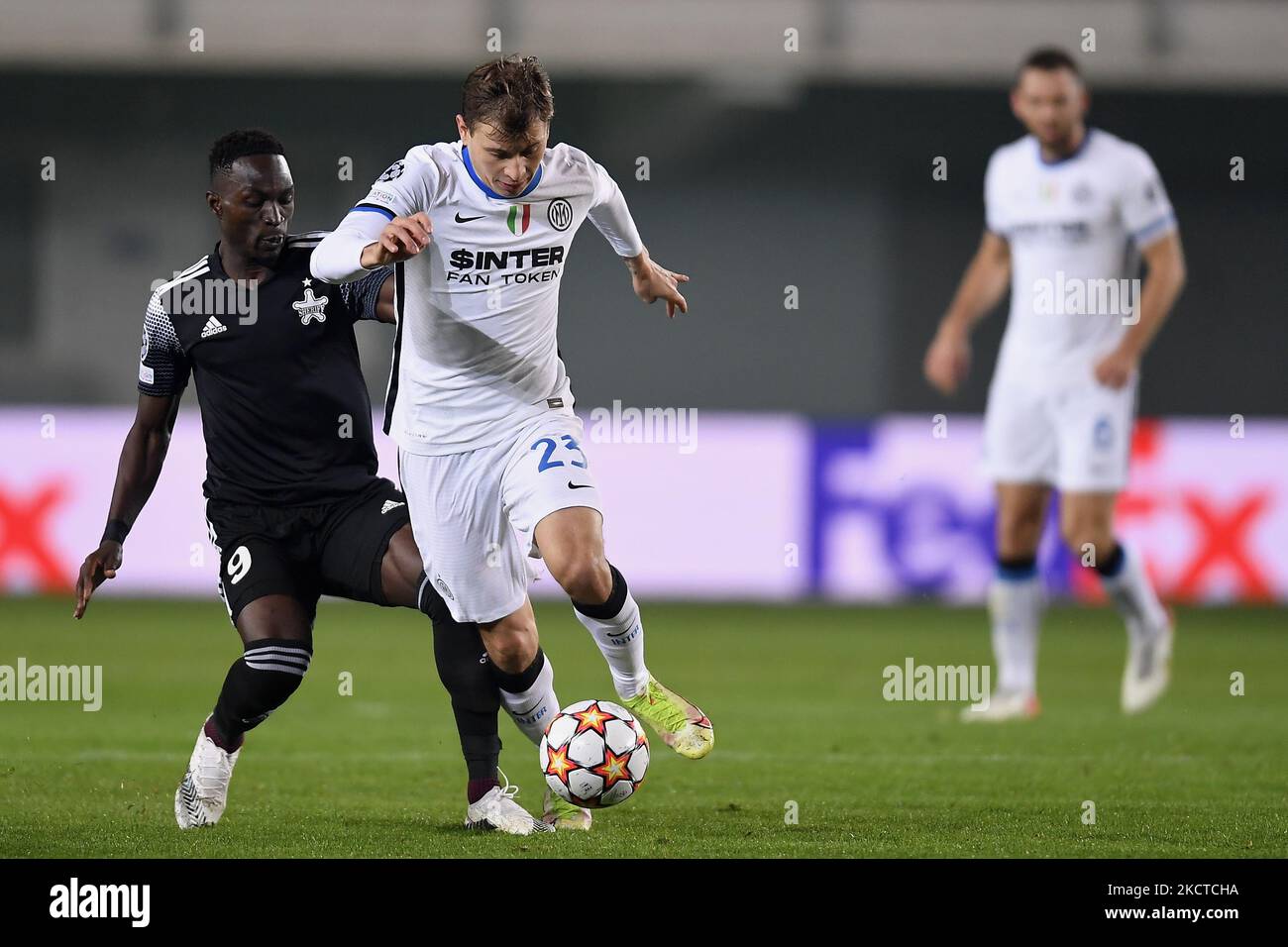 Nicolo Barella and Adama Traore in action during the UEFA Champions League group D football match between Sheriff and Inter Milan at Sheriff Stadium in Tiraspol on November 3, 2021. (Photo by Alex Nicodim/NurPhoto) Stock Photo