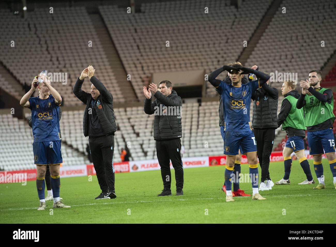 Mansfield Town manager Nigel Clough applauds Mansfield Towns away supporters after the FA Cup match between Sunderland and Mansfield Town at the Stadium Of Light, Sunderland on Saturday 6th November 2021. (Credit: Trevor Wilkinson | MI News) (Photo by MI News/NurPhoto) Stock Photo