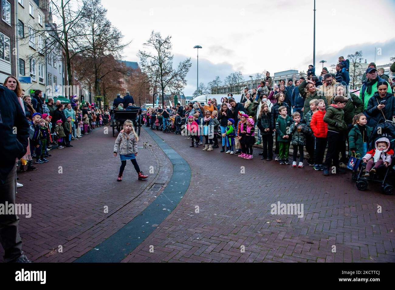 Thousands of children are waiting on the streets to see St. Nicholas arriving in the city accompanied for the first time by St Nicholas’ helpers without blackface makeup, and wearing elegant historical costumes in Arnhem, on November 13th, 2021. (Photo by Romy Arroyo Fernandez/NurPhoto) Stock Photo