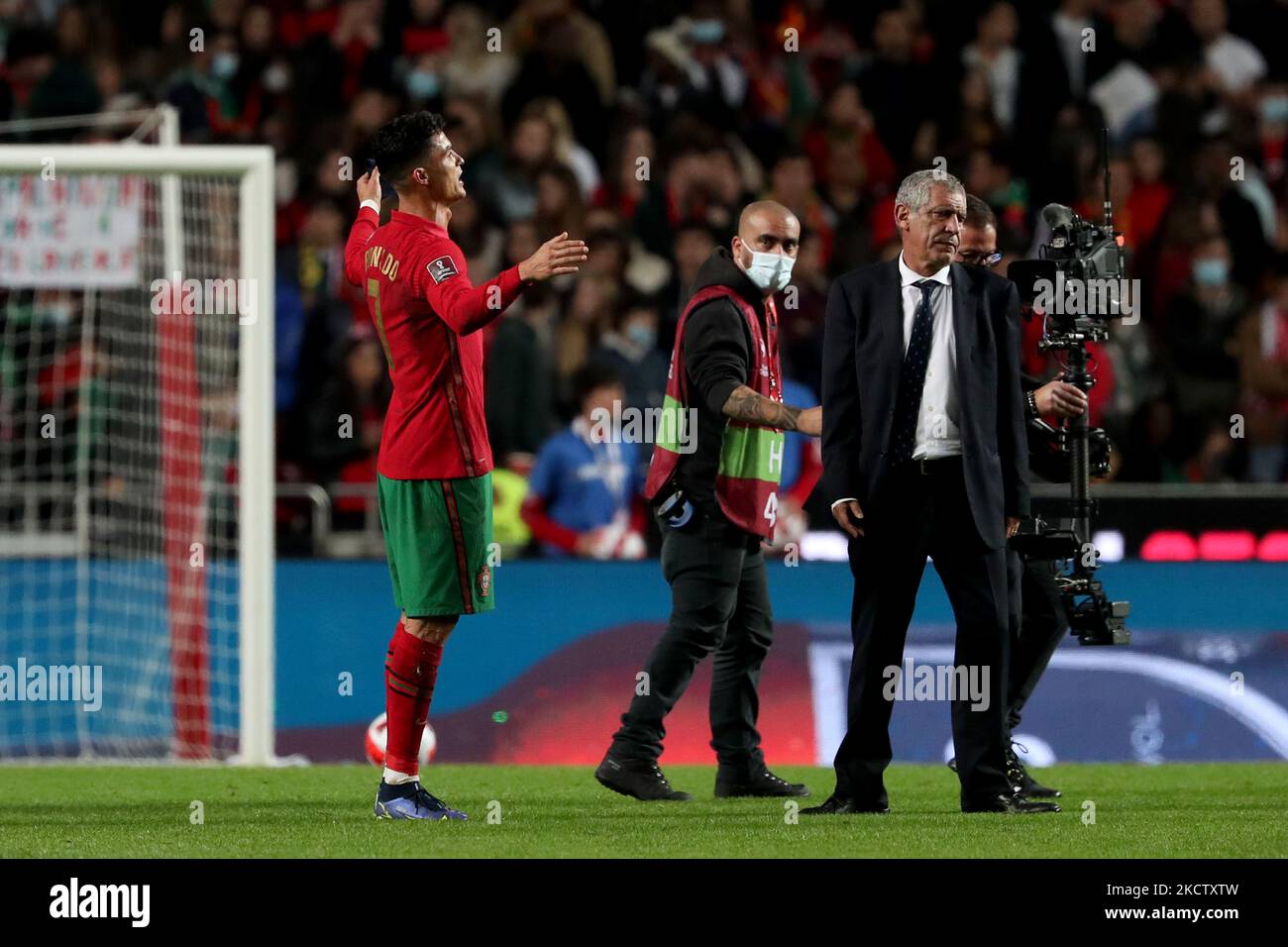 Portugal's forward Cristiano Ronaldo (L) reacts at the end of the FIFA World Cup Qatar 2022 qualification group A football match between Portugal and Serbia at the Luz stadium in Lisbon, Portugal, on November 14, 2021. (Photo by Pedro FiÃºza/NurPhoto) Stock Photo