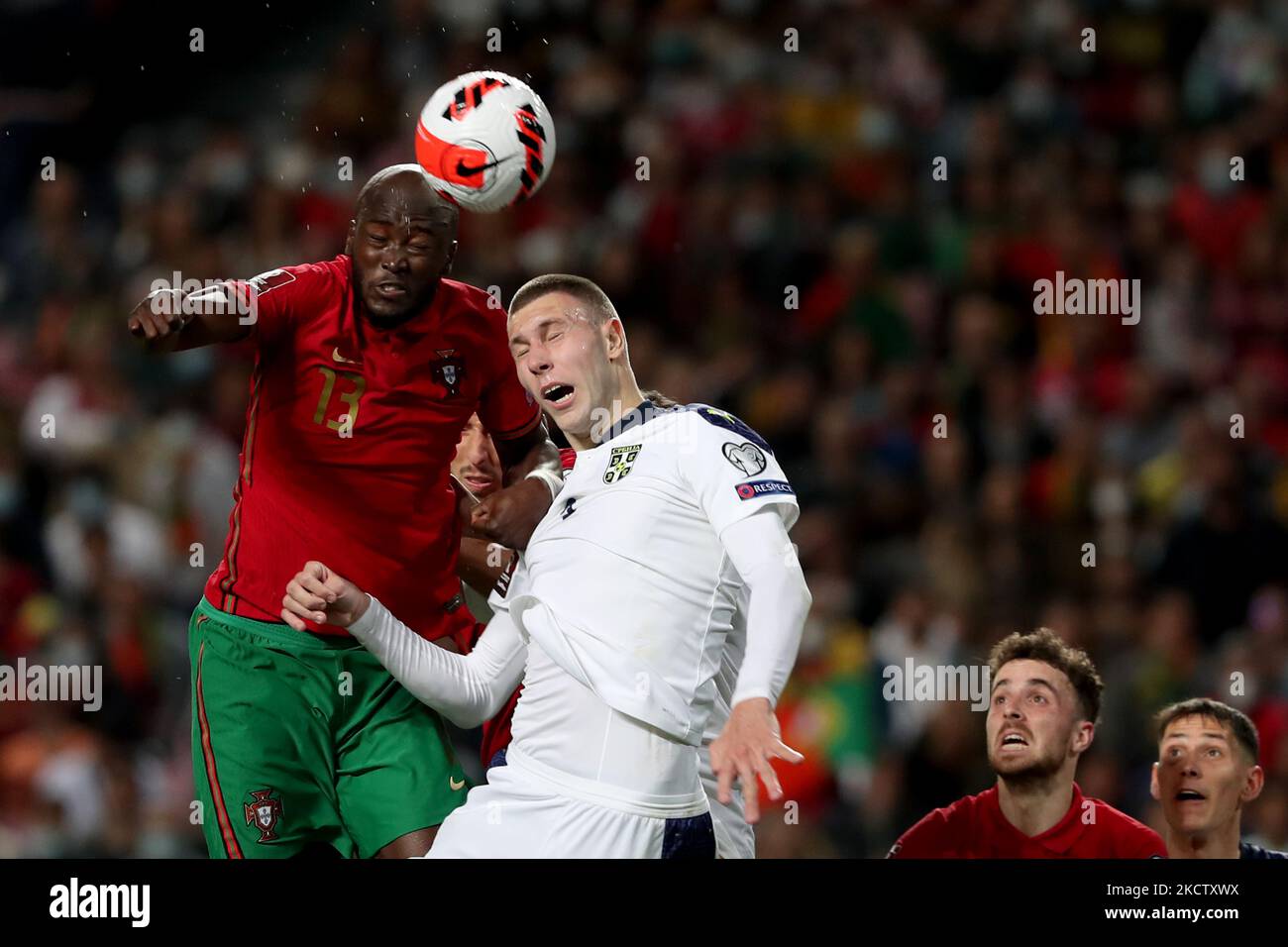 Portugal's midfielder Danilo (L) vies with Serbia's defender Strahinja Pavlovic during the FIFA World Cup Qatar 2022 qualification group A football match between Portugal and Serbia at the Luz stadium in Lisbon, Portugal, on November 14, 2021. (Photo by Pedro FiÃºza/NurPhoto) Stock Photo