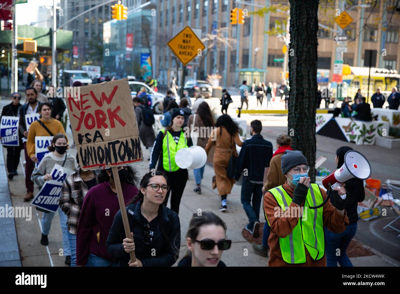 Dozens of union members affiliated with the Student Workers of Columbia ...