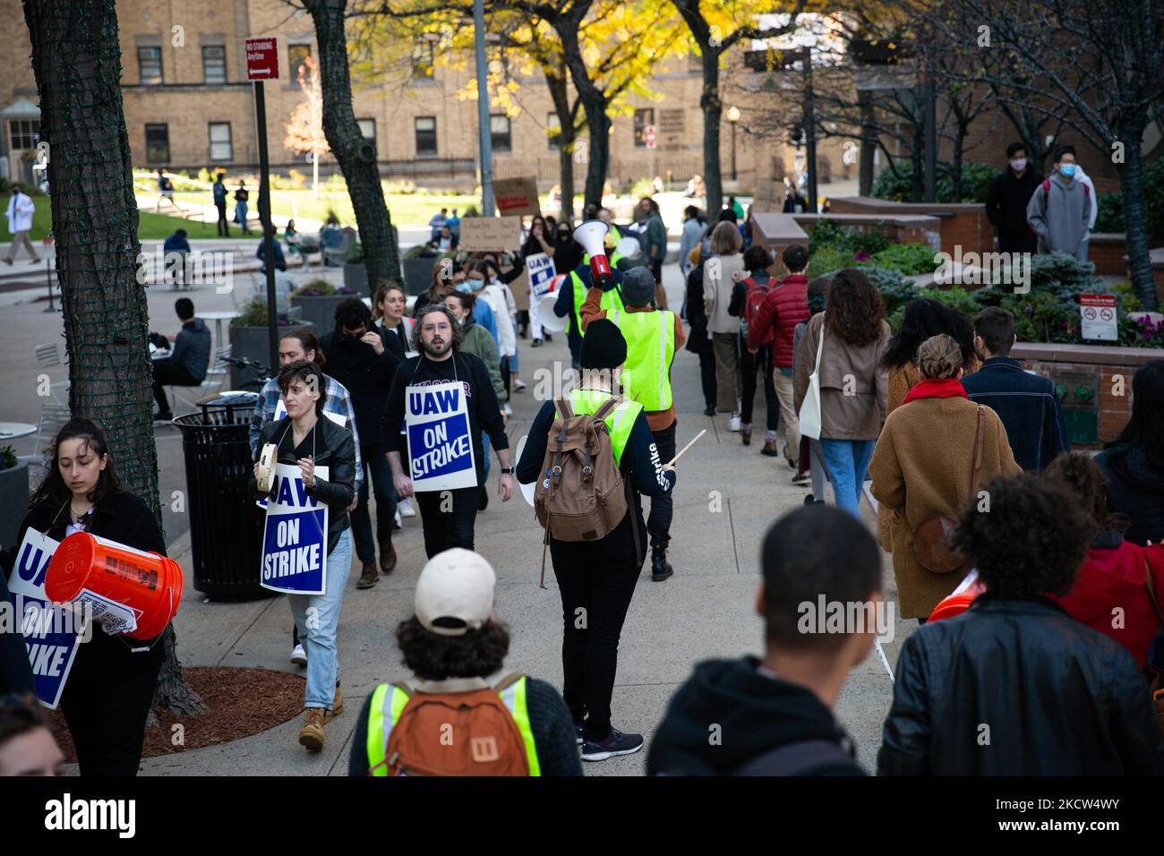 Dozens of union members affiliated with the Student Workers of Columbia ...