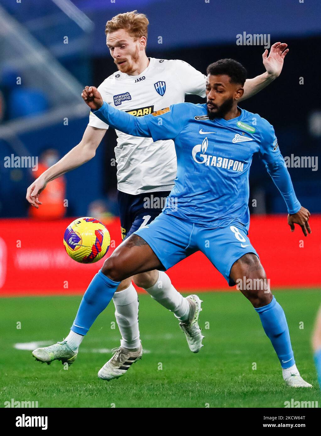Wendel (R) of Zenit St. Petersburg and Pavel Mogilevets of Nizhny Novgorod vie for the ball during the Russian Premier League match between FC Zenit Saint Petersburg and FC Nizhny Novgorod on November 19, 2021 at Gazprom Arena in Saint Petersburg, Russia. (Photo by Mike Kireev/NurPhoto) Stock Photo