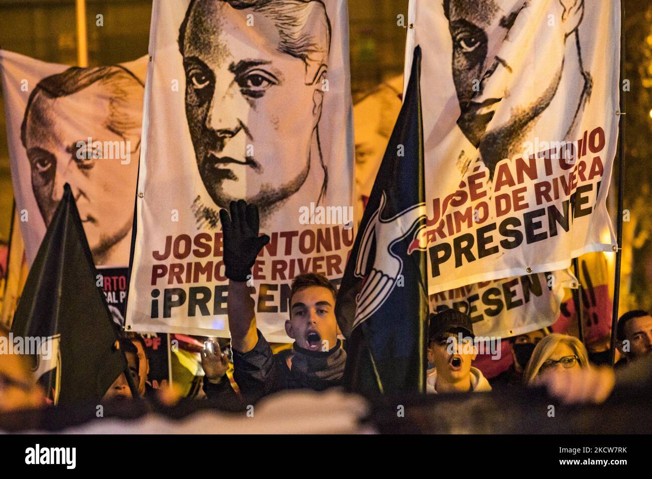 Supporters of Jose Antonio Primo de Rivera shout and make the fascist salute during a march in Madrid for the anniversary of his death. Jose Antonio Primo de Rivera was a supporter of the Franco dictator coup in the Spanish Civil War. (Photo by Celestino Arce/NurPhoto) Stock Photo