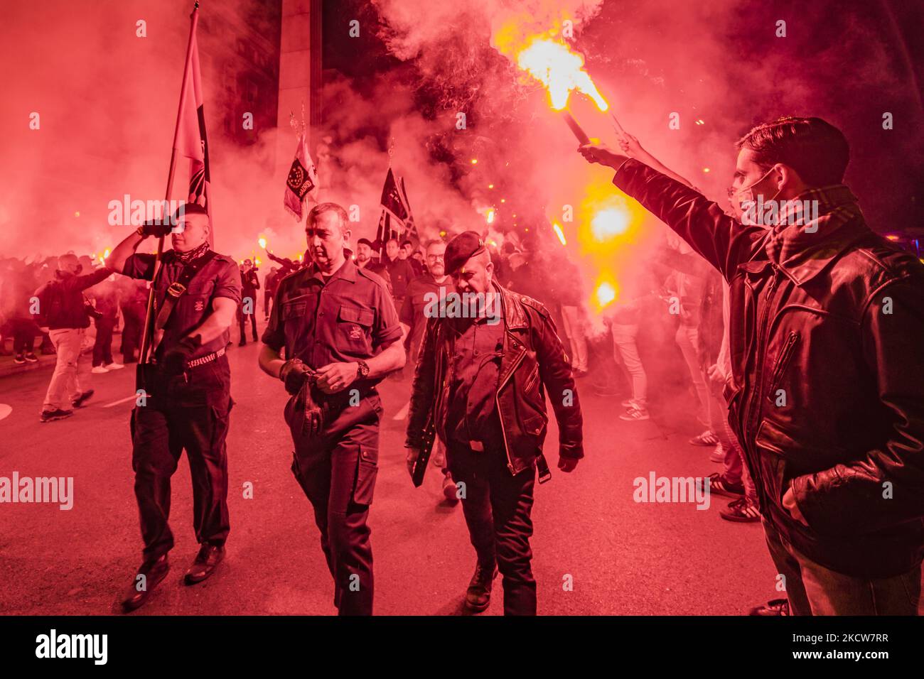 Flares during a march in Madrid for the anniversary of the fascist Jose Antonio Primo de Rivera, supporter of the Franco dictator coup in the Spanish Civil War. (Photo by Celestino Arce/NurPhoto) Stock Photo
