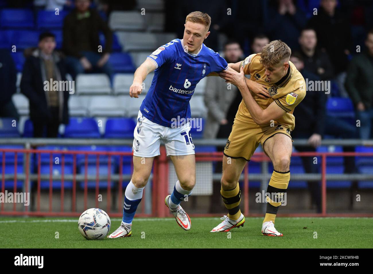 Oldham Athletic's Davis Keillor-Dunn tussles with Lewis Cass of Port Vale during the Sky Bet League 2 match between Oldham Athletic and Port Vale at Boundary Park, Oldham on Saturday 20th November 2021. (Photo by Eddie Garvey/MI News/NurPhoto) Stock Photo