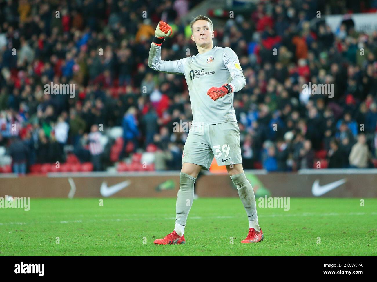 Sunderland Goalkeeper Ron-Thorben Hoffmann celebrates with a fist pump to the fans at full time during the Sky Bet League 1 match between Sunderland and Ipswich Town at the Stadium Of Light, Sunderland on Saturday 20th November 2021. (Photo by Michael Driver/MI News/NurPhoto) Stock Photo