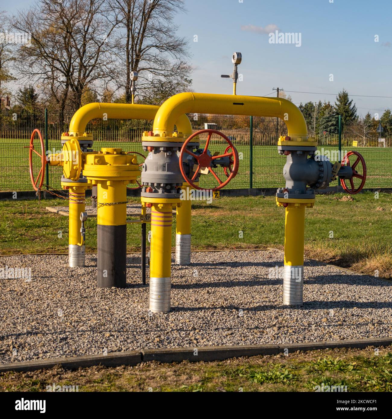 Big gas pipe natural gas transport system. Transmission infrastructure coming from the ground