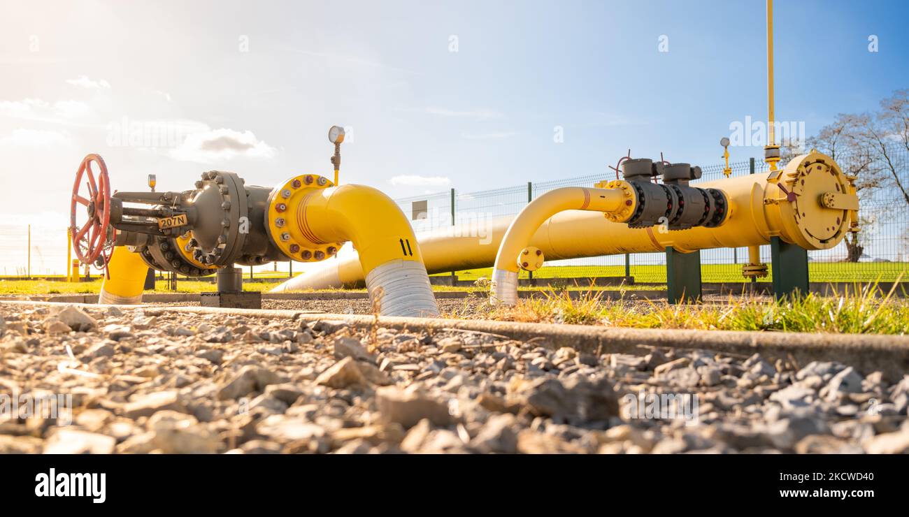 Big gas pipe natural gas transport system. Transmission infrastructure coming from the ground