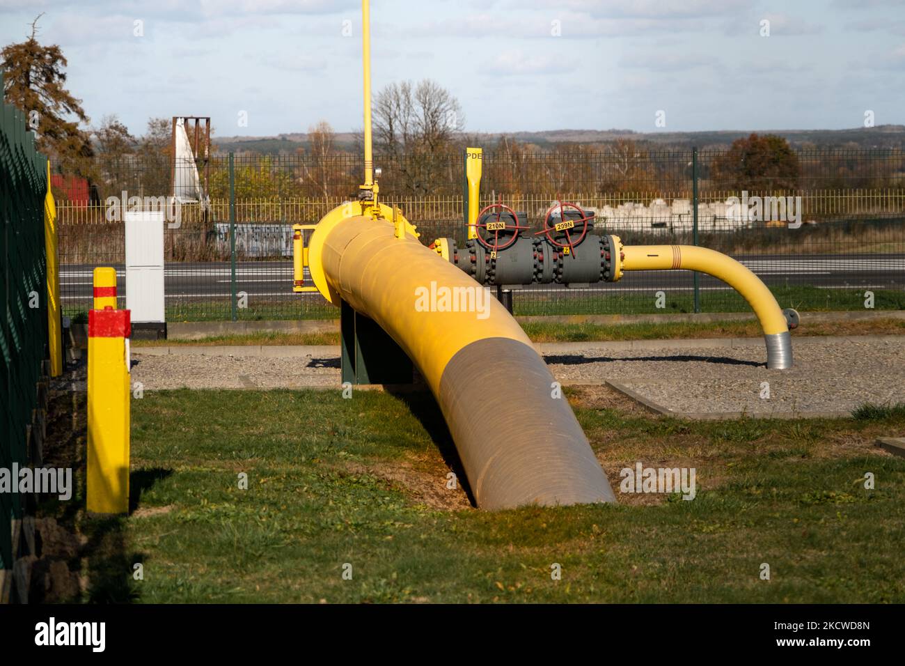Big gas pipe natural gas transport system. Transmission infrastructure coming from the ground