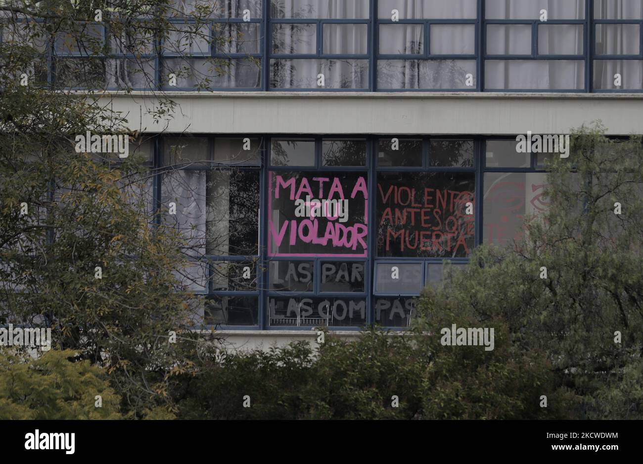 Signs against male violence on the windows of the Faculty of Philosophy and Letters at the National Autonomous University of Mexico (UNAM), Mexico City. (Photo by Gerardo Vieyra/NurPhoto) Stock Photo