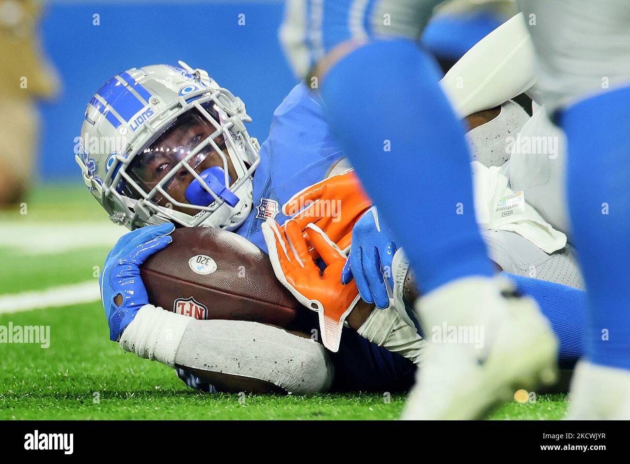 Detroit Lions running back Jamaal Williams (30) is tackled during an NFL football game between the Detroit Lions and the Chicago Bears in Detroit, Michigan USA, on Thursday, November 25, 2021. (Photo by Amy Lemus/NurPhoto) Stock Photo