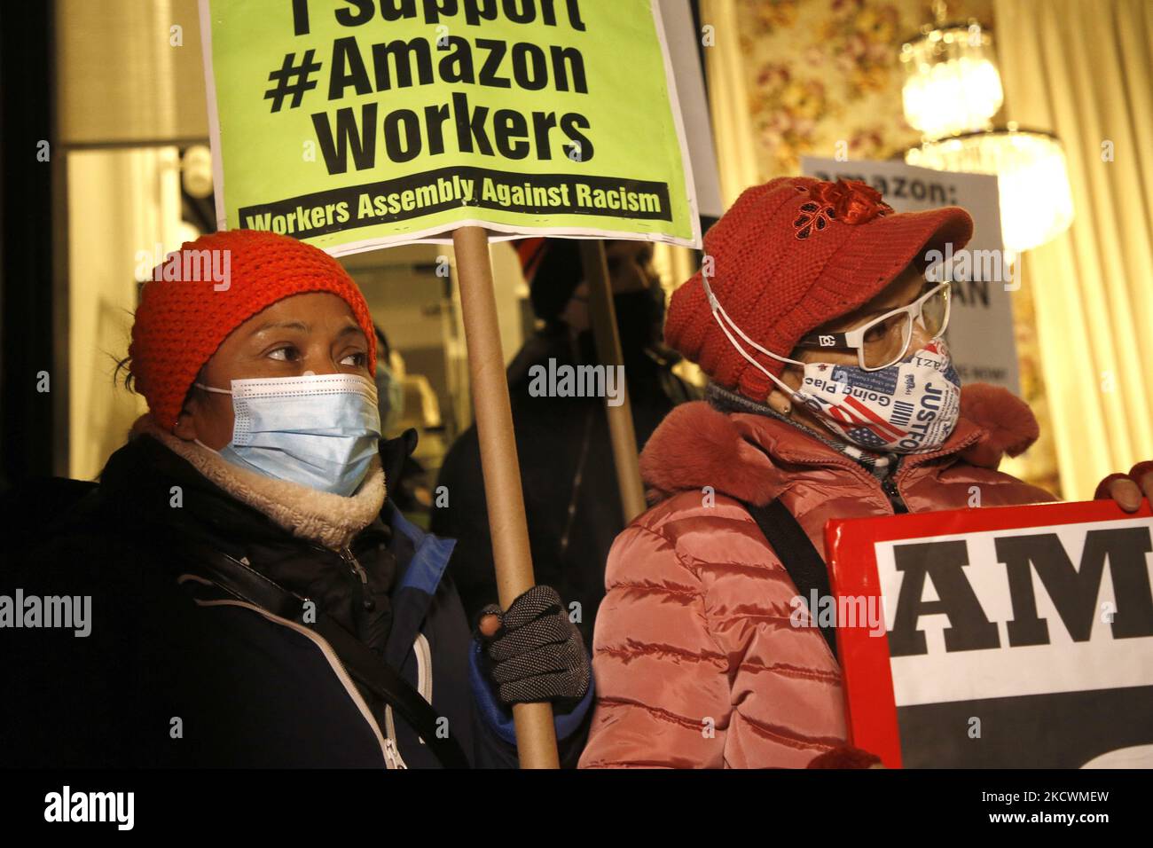 Demonstrators rally in front of CEO of Amazon Jeff Bezos residence