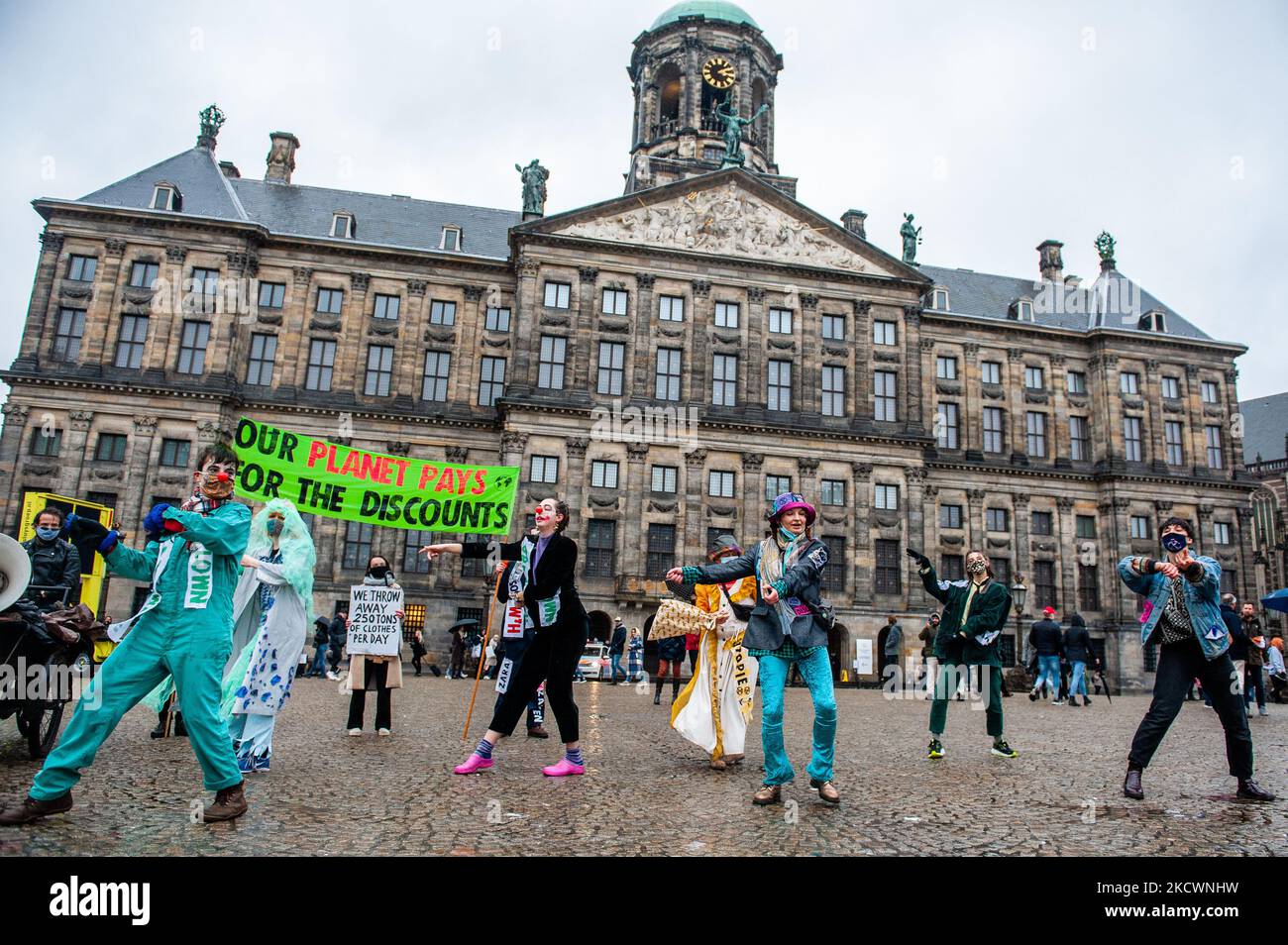 A group of XR activists is dancing Toxic by Britney Spears with the lyrics changed against climate change, during a fashion parade organized by XR, against Black Friday in Amsterdam, on November 27th, 2021. (Photo by Romy Arroyo Fernandez/NurPhoto) Stock Photo