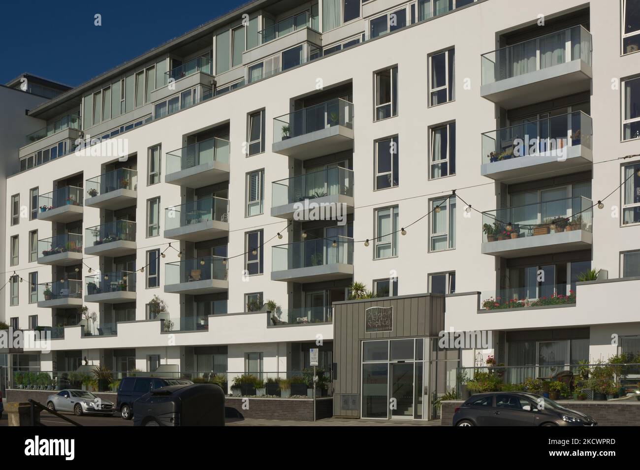 New modern apartment building on seafront at Worthing, West Sussex, England Stock Photo